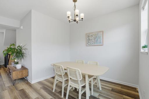 Designed for lingering conversations and shared meals, this airy dining space with beautiful natural light offers the perfect setting for everything from morning coffee to memorable celebrations.