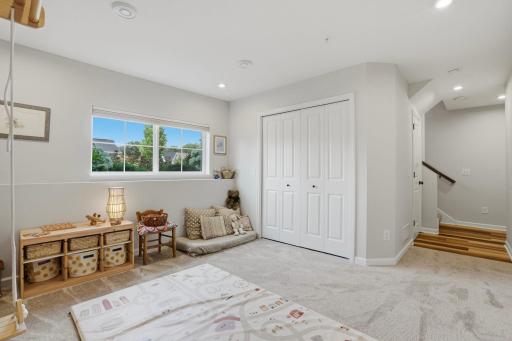 Fresh carpet in the lower-level flex space (2024) adds comfort and a fresh, updated feel.