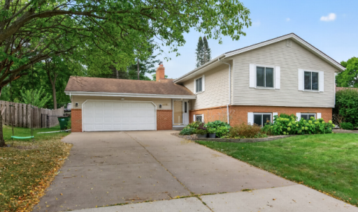 Come Home to an Attached Garage and Beautiful Landscaping