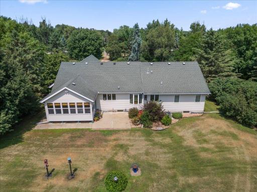 Notice the 50-year shingles, bay window and landscaping