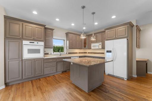 A kitchen that actually makes cooking fun - quartz countertops, high-end appliances, and a great layout.
