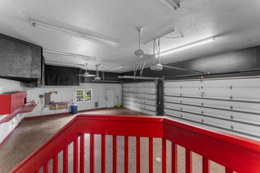 Kick-ass, heated/insulated 4-stall (with high ceilings) attached garage!