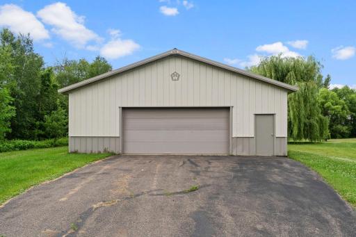 The pole barn is massive - 37x53 feet of wide-open, fully usable space with concrete floors and oversized doors.