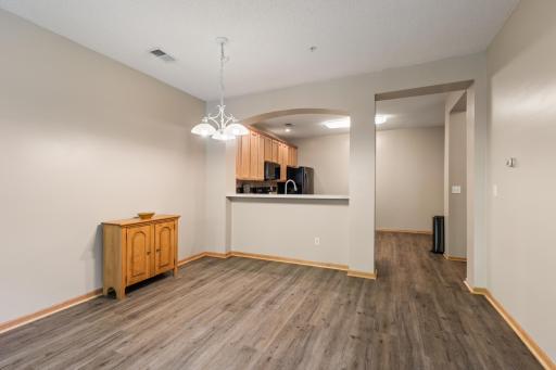 Room for a large dining room table and breakfast bar seating.