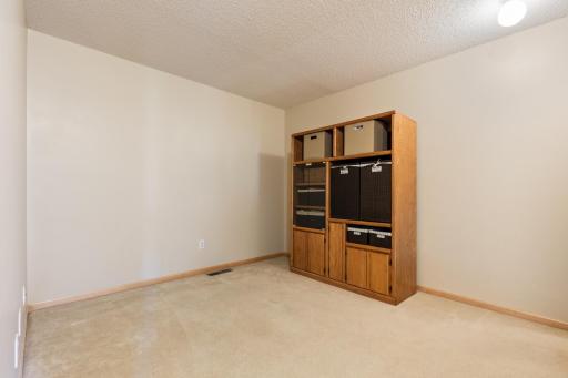 Versatile space that would make a great home office, toy room, family room or home gym.
