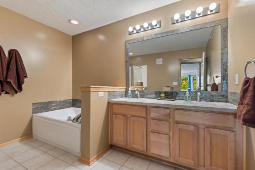 Large double vanity with great storage and countertop space.