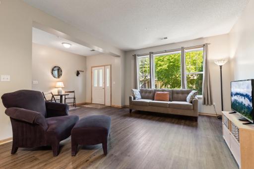 Natural light pours in from the oversized windows.