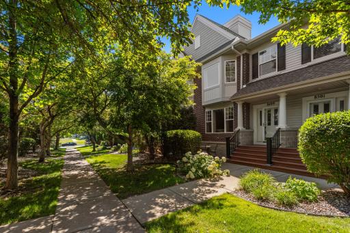 Lush landscaping with tree lined sidewalks provide shade, privacy & wildlife views.