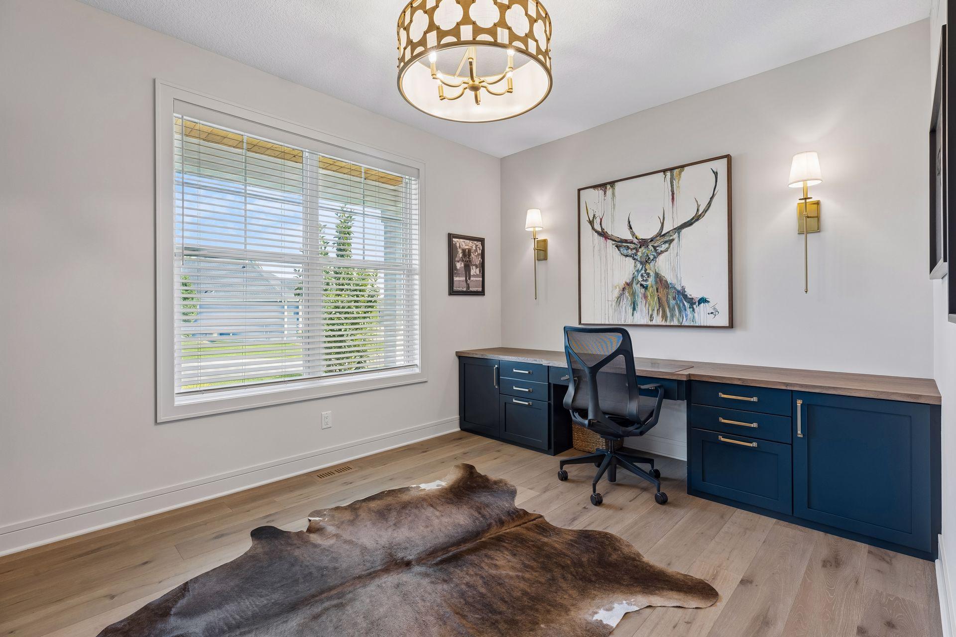 Main level office or flex room with custom built-in cabinetry