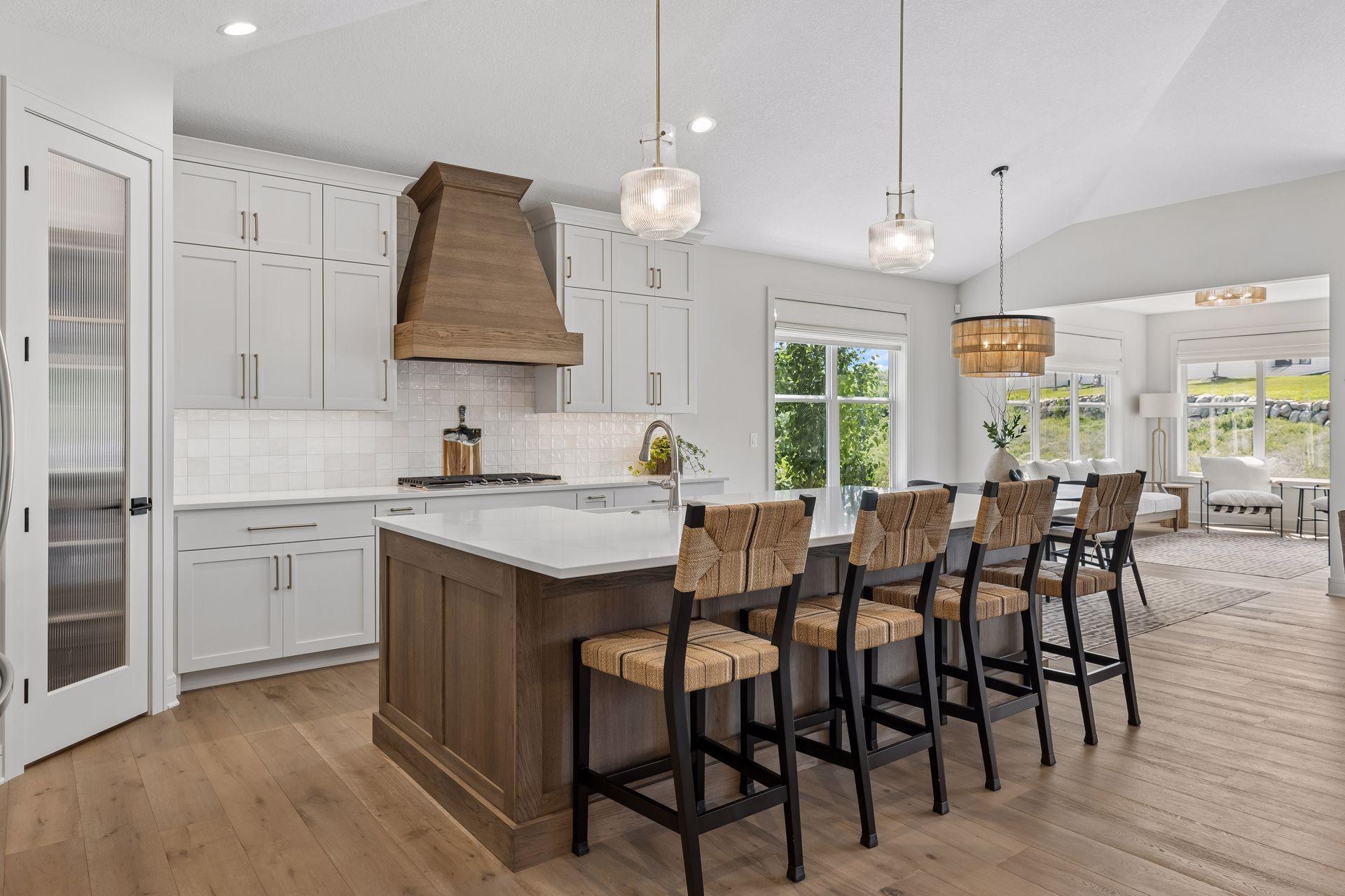 Large kitchen island with square panel detailing.