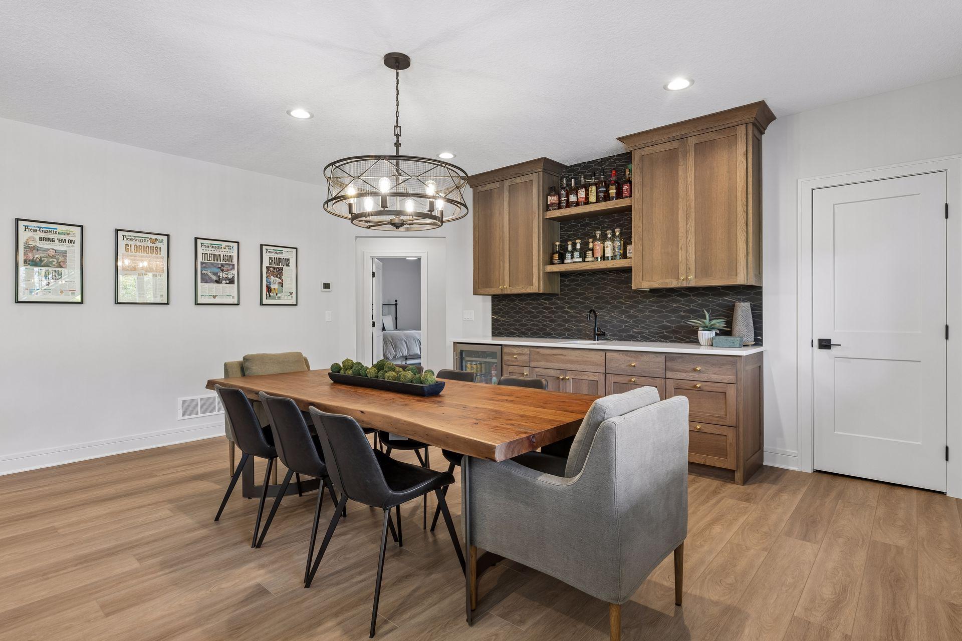 The finished lower-level offers an entertainment space, recreational/game space, two additional bedrooms, and a full bath.