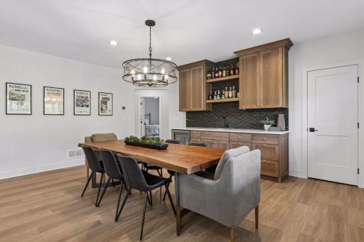 The finished lower-level offers an entertainment space, recreational/game space, two additional bedrooms, and a full bath.