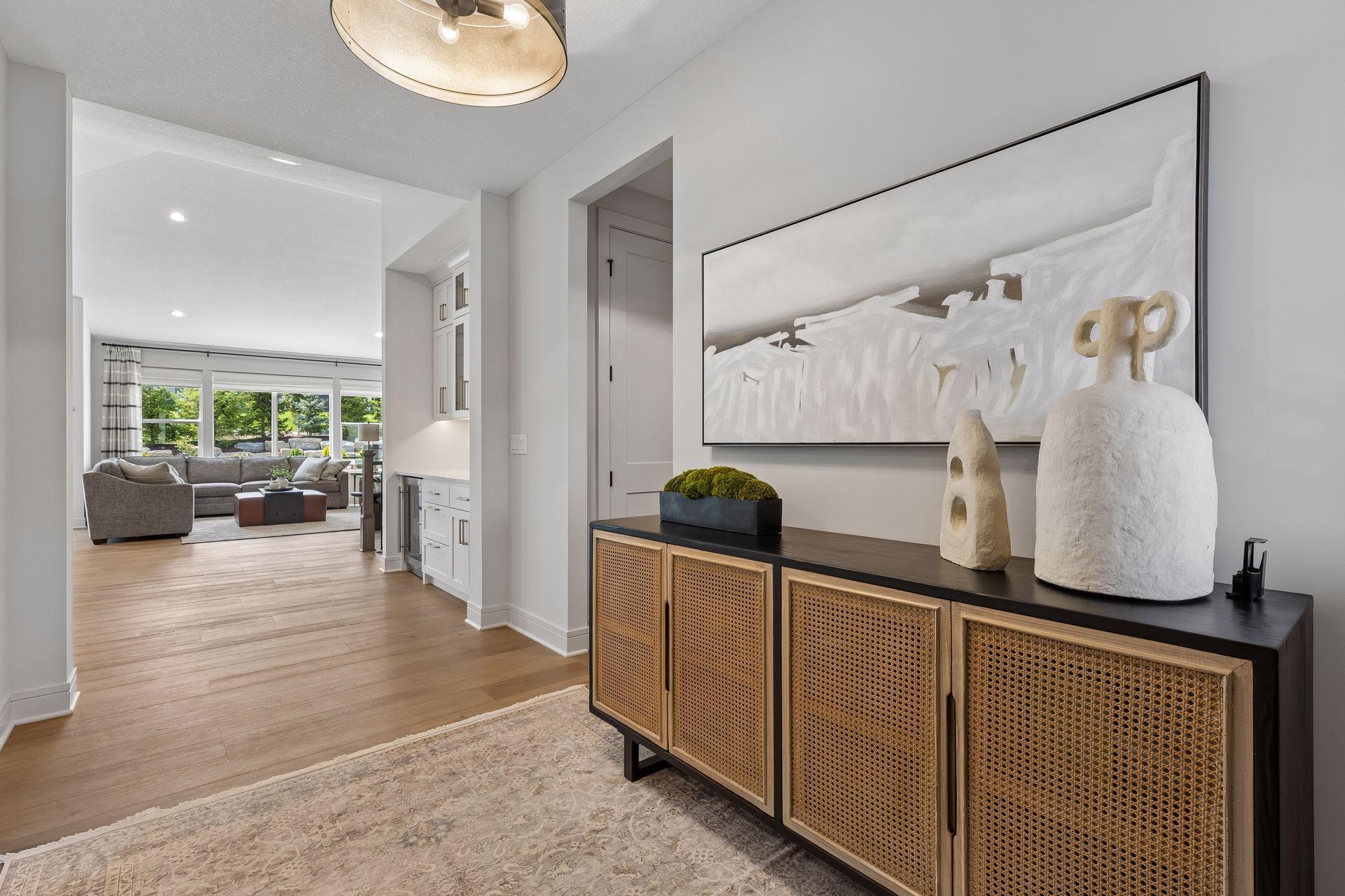Immediately upon entering this home you will be drawn in by the appealing aesthetics and natural light