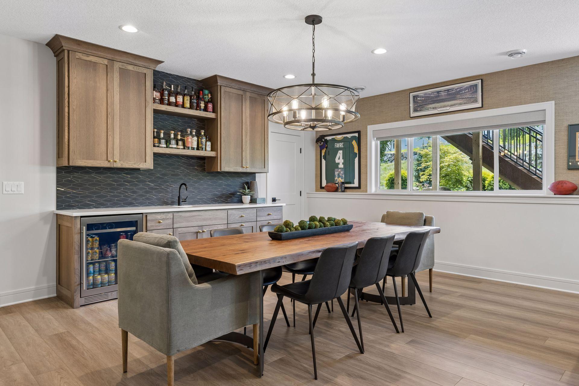 Walk-up wet bar with cabinets to the ceiling, floating shelves and beverage center.
