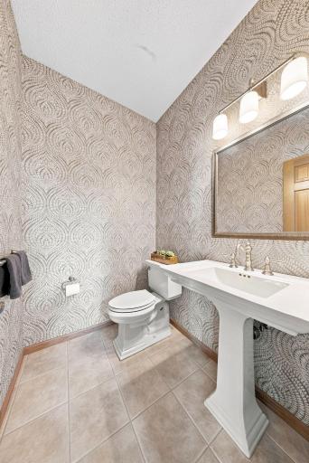 Such a pretty half bath on the main level