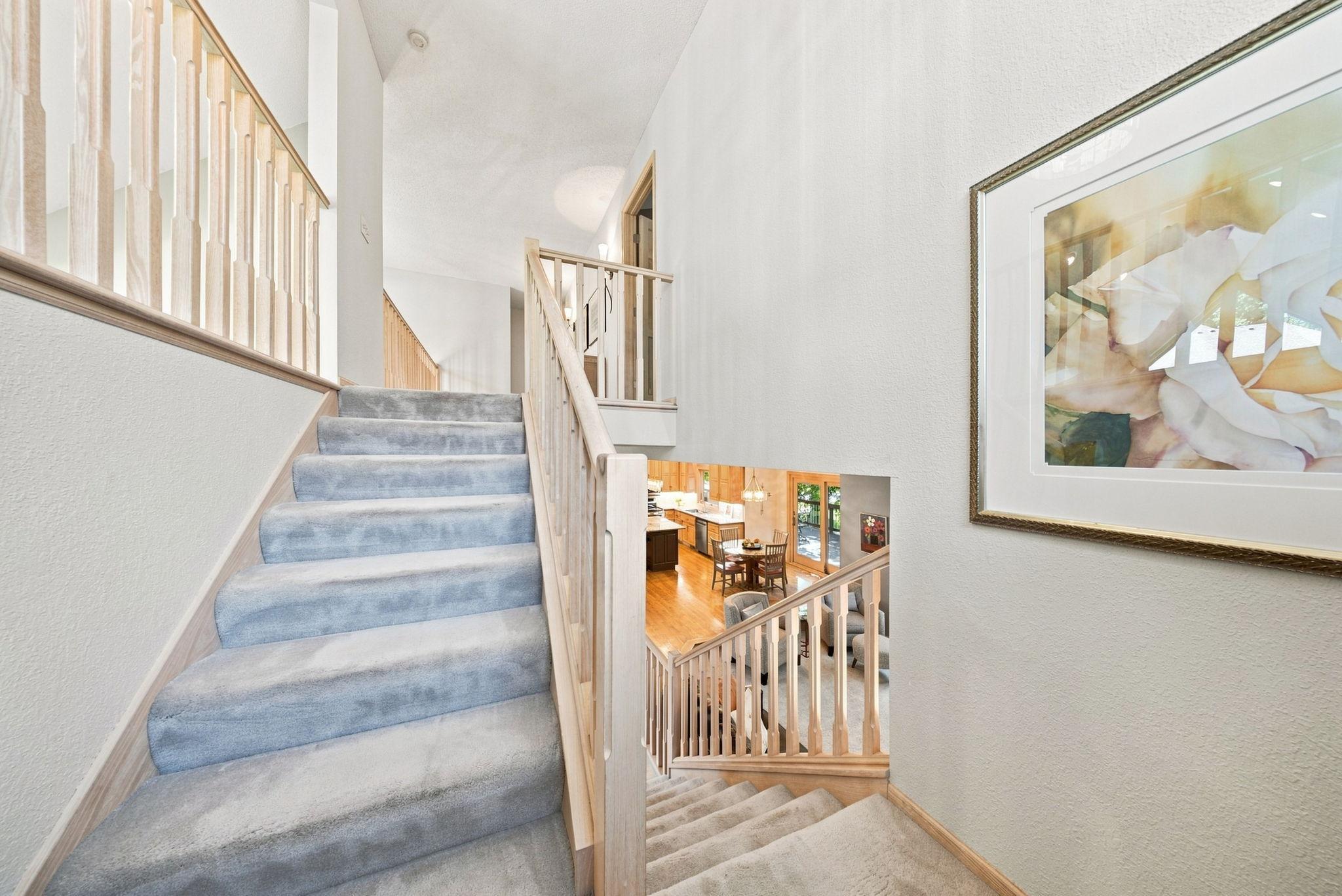 The turned staircase opens to a catwalk on the upper level