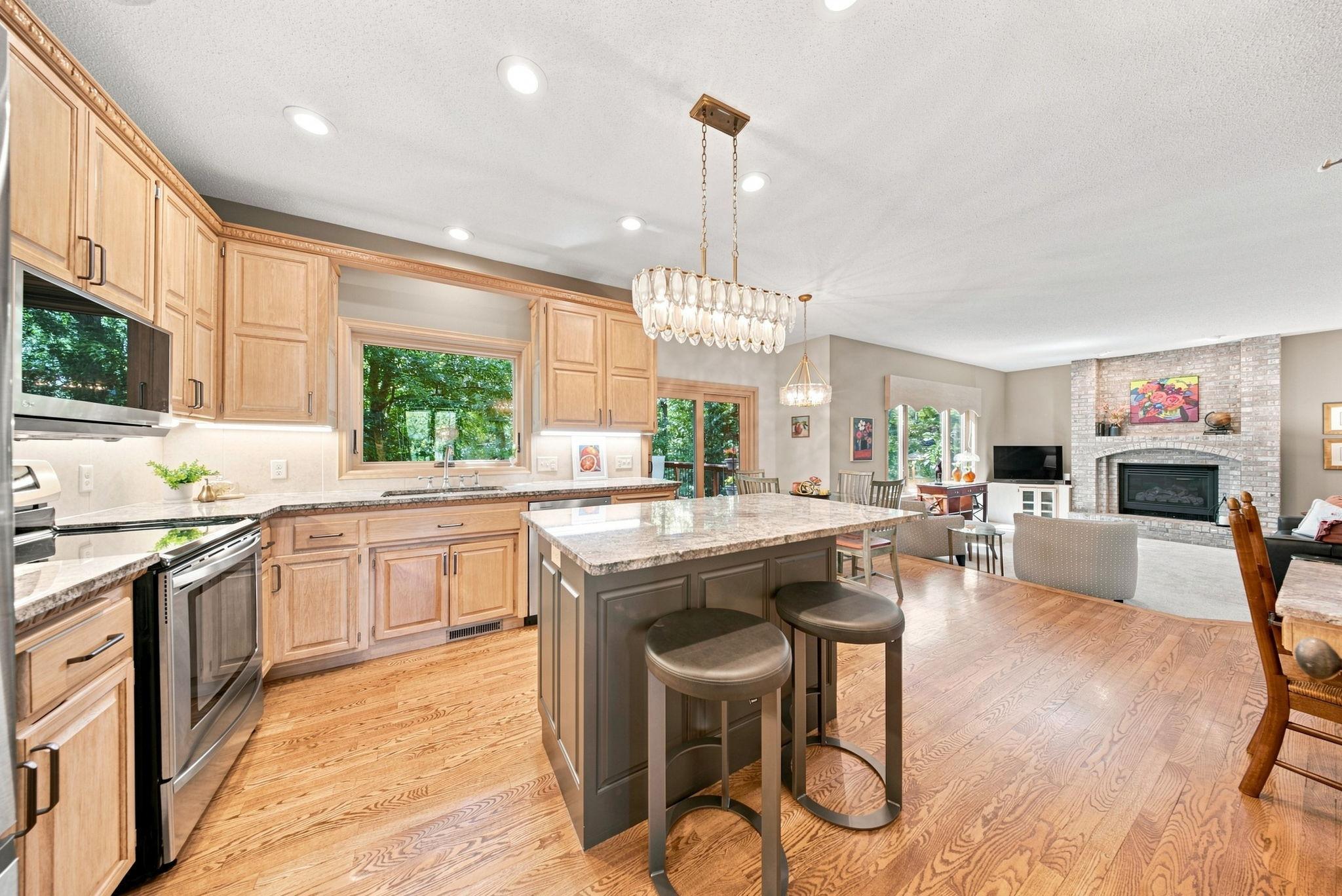 Open and inviting kitchen with wood floors