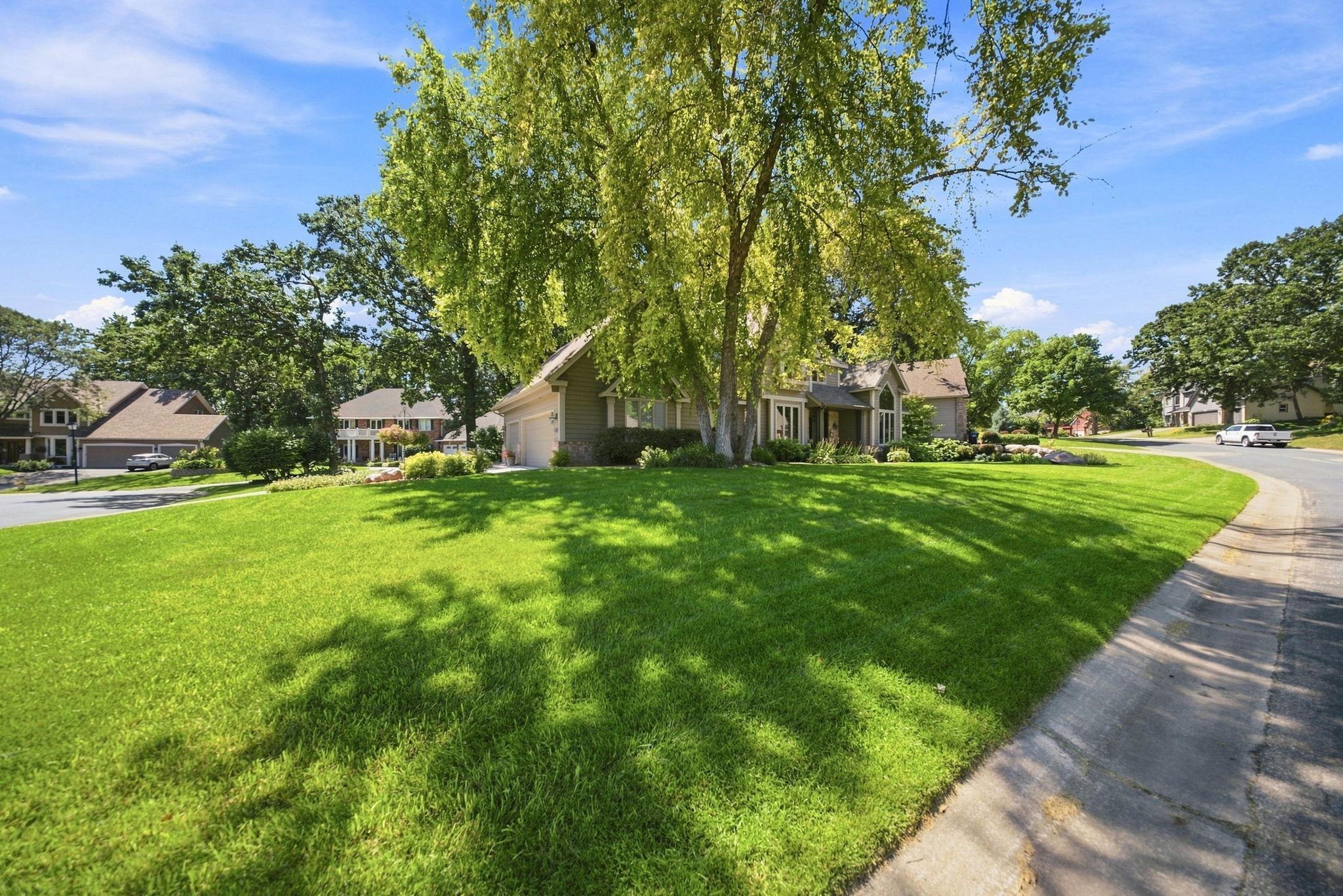 View of the home and it's corner lot
