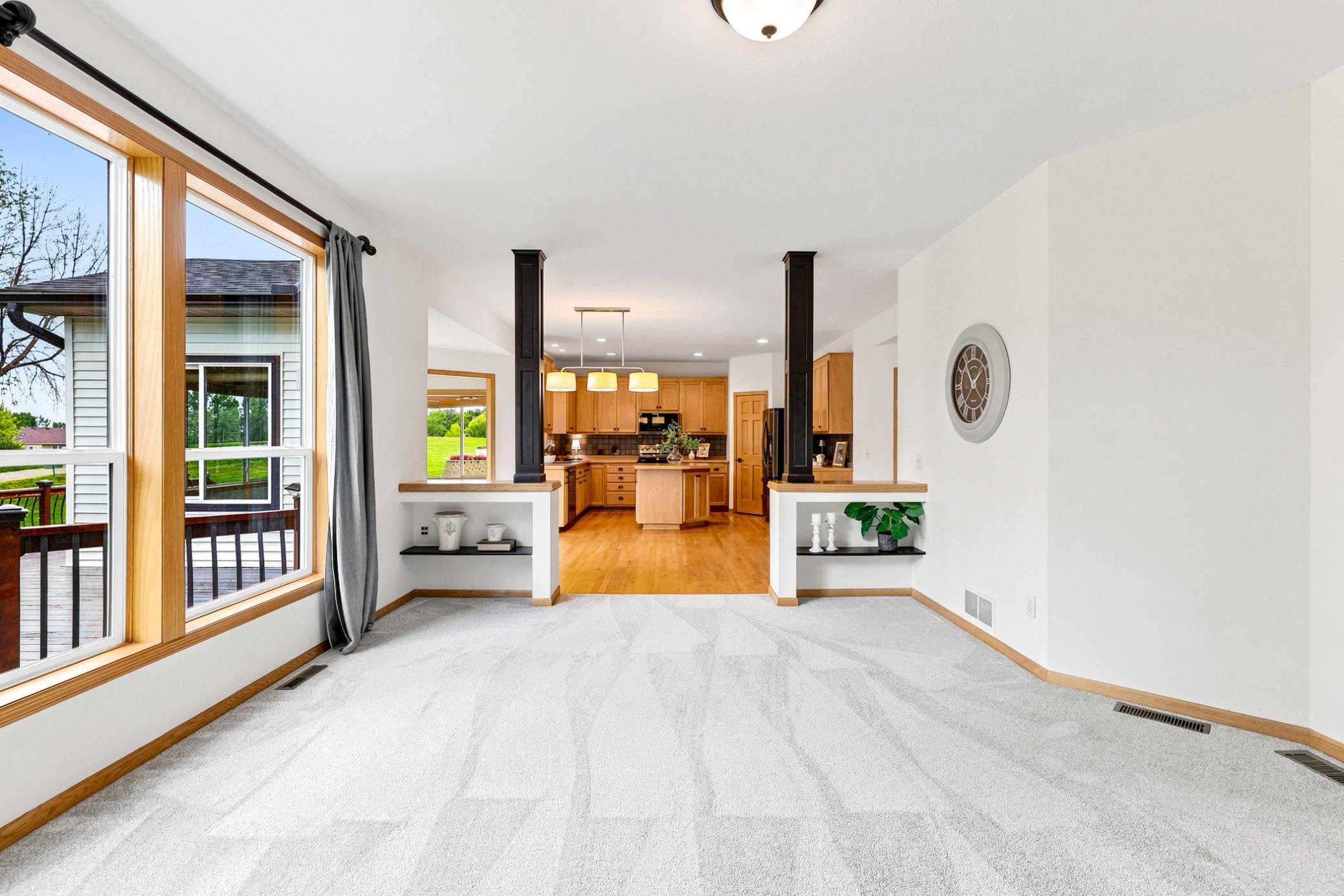 Designed for effortless everyday living and entertaining, the open-concept layout seamlessly connects the great room to the spacious kitchen while maintaining defined architectural spaces.