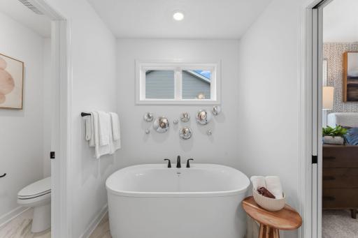 (Photo of a decorate model, actual homes finishes will vary) Another view of the primary bath.