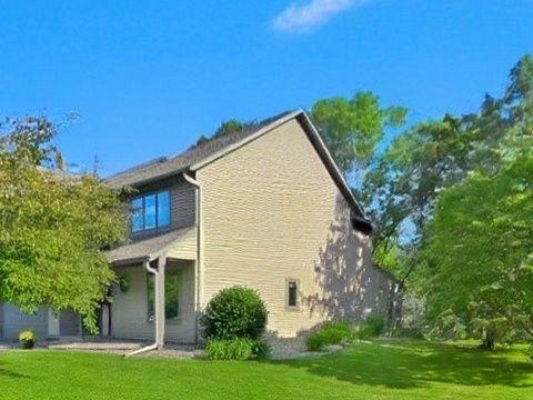 Three bedroom, three bath, two car, end unit on a pond!