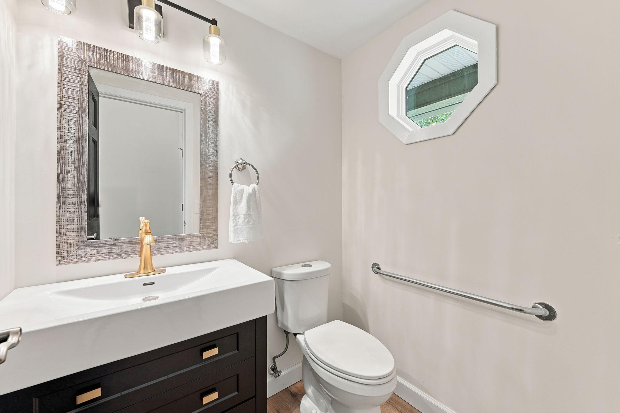 Convenient powder room for guests!
