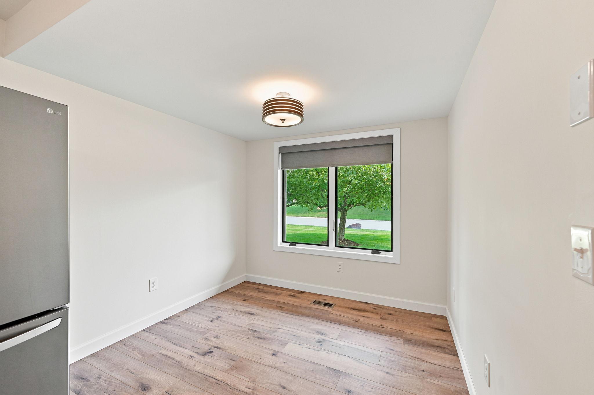 The informal dining area can easily handle any size table setting!