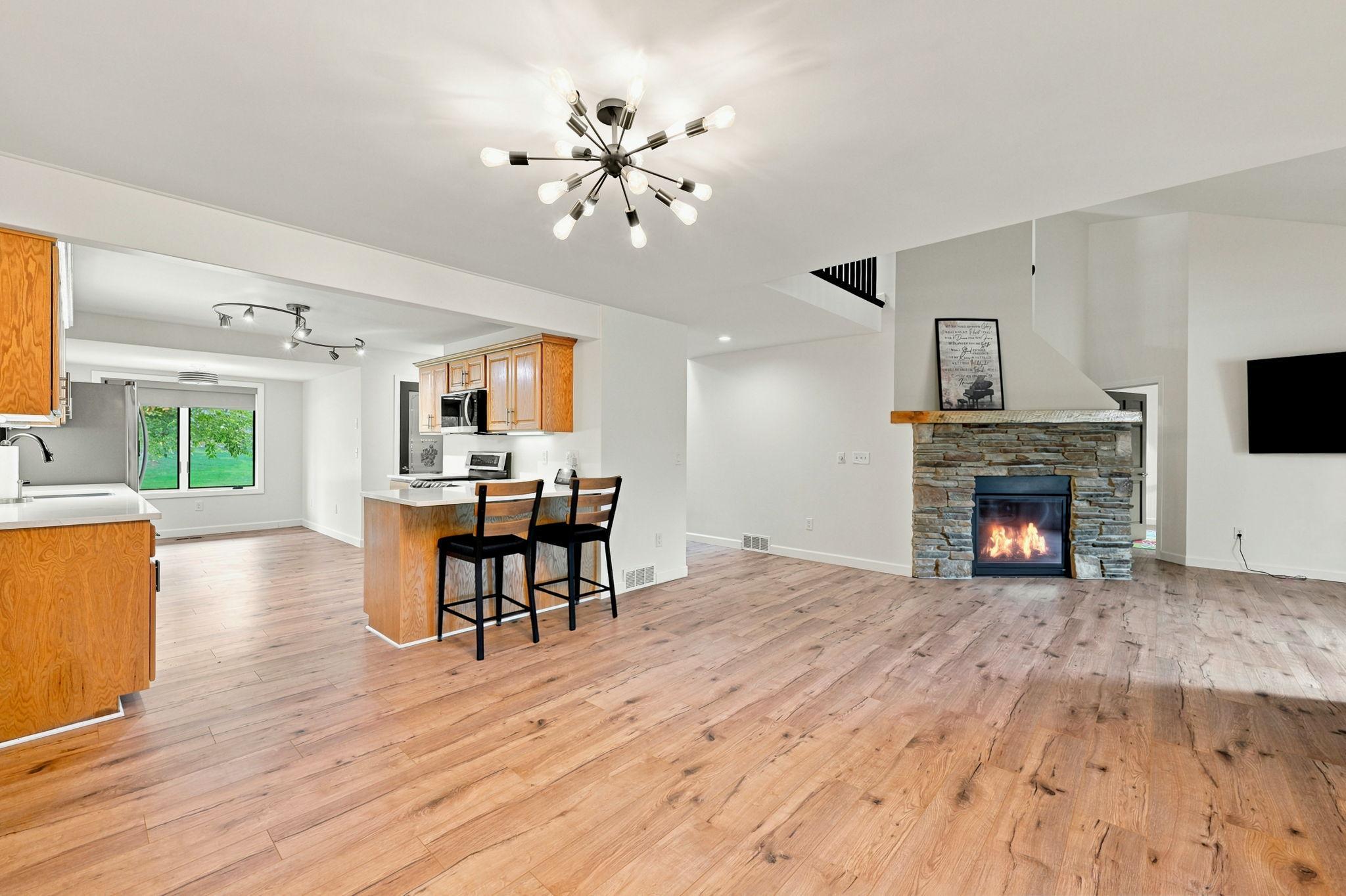 The great room design creates flexible space for formal dining and main living area, depending on your lifestyle needs!