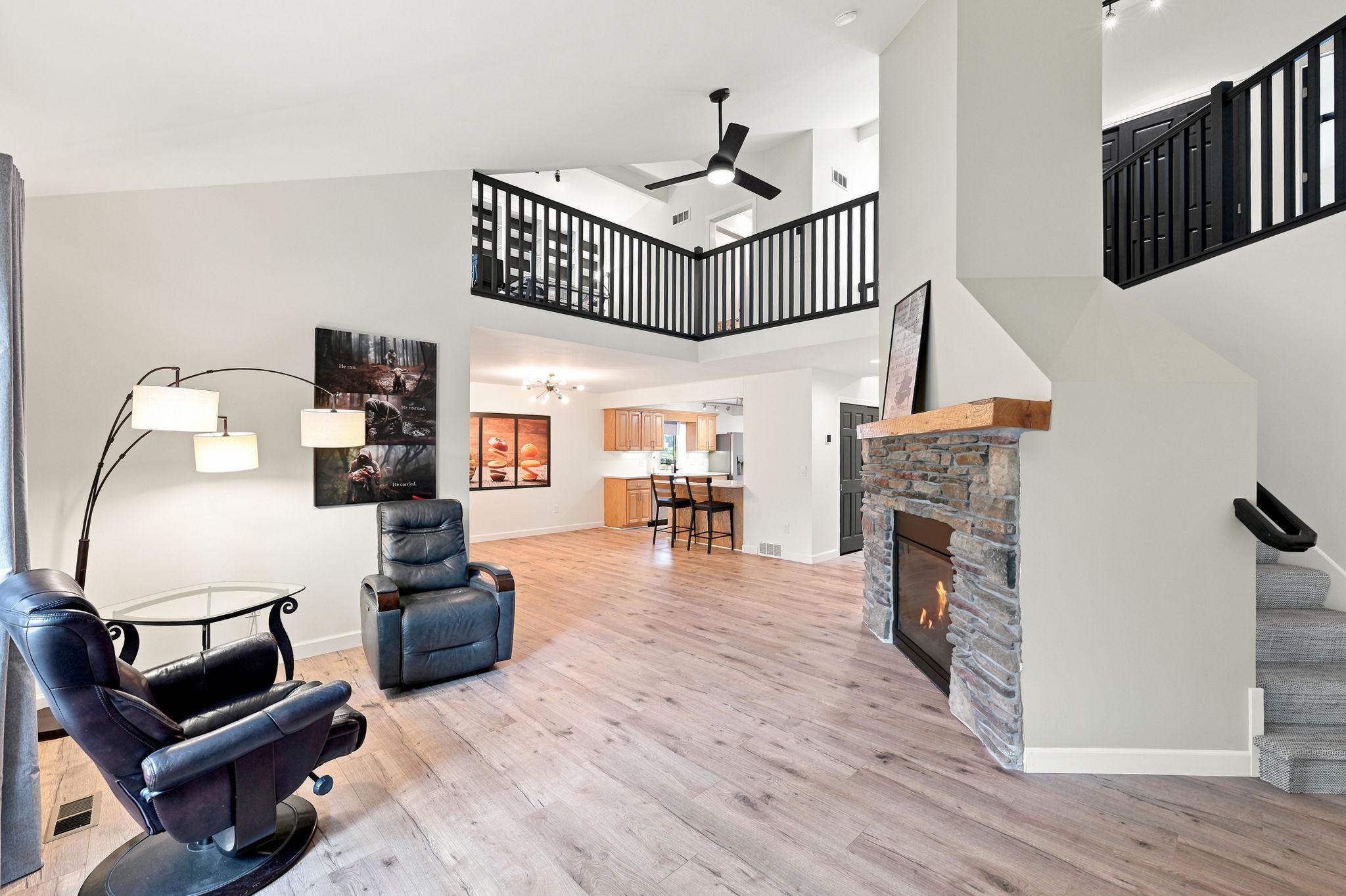 Enjoy the open great room design with exciting, soaring vaults and structural beams!