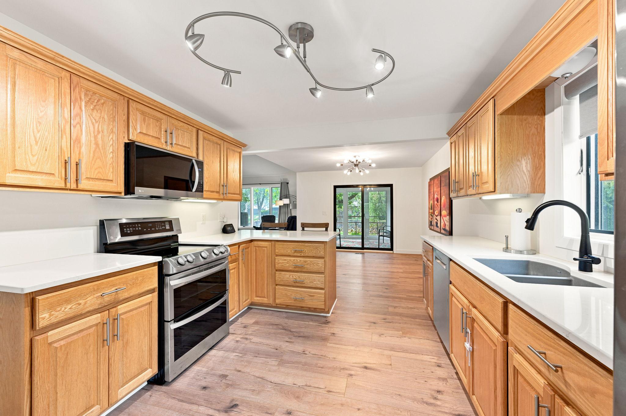 This great kitchen includes an abundance of counter and cabinet space with under cabinet lighting!
