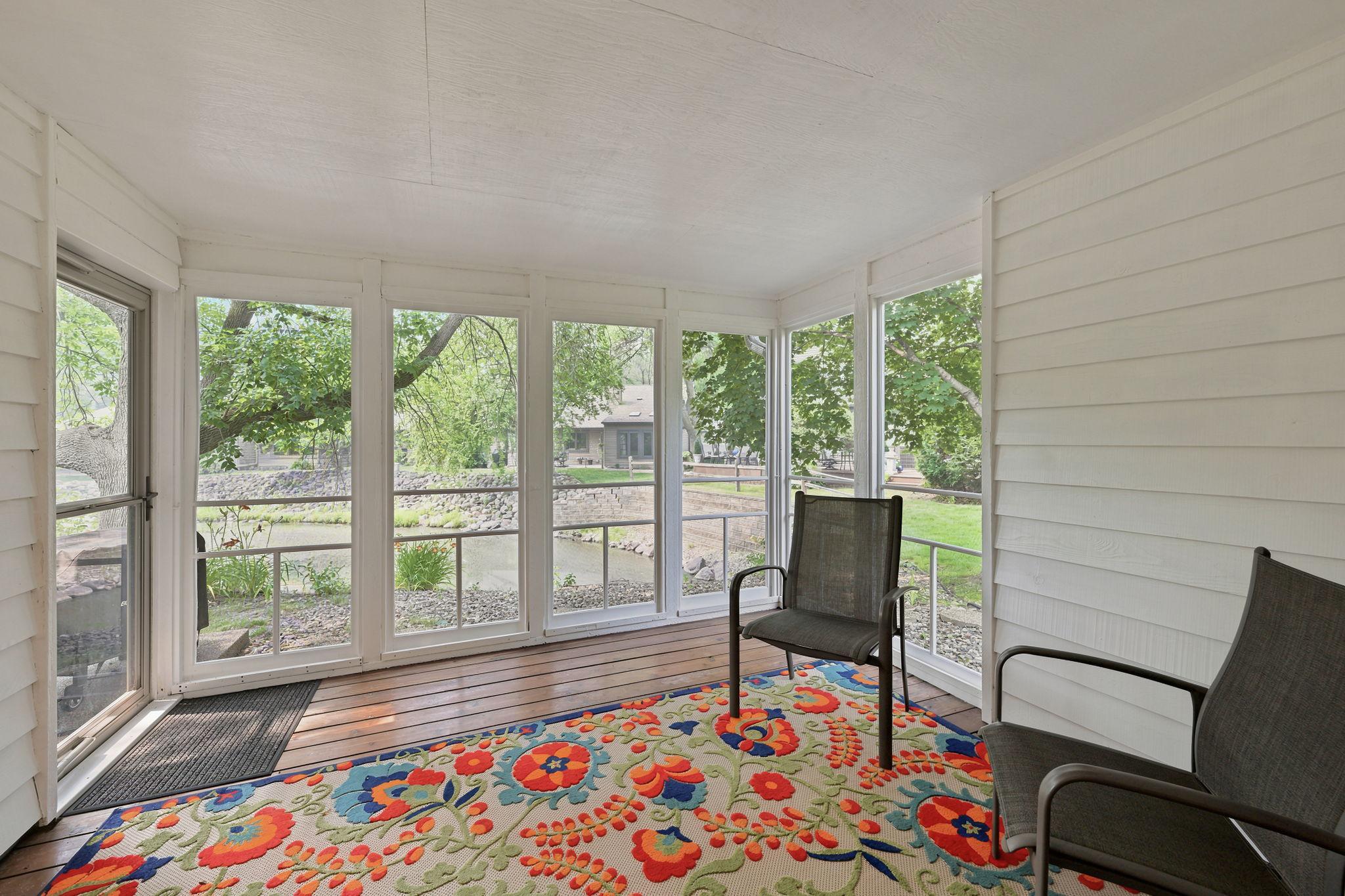 Wonderful screen porch overlooking the pond!