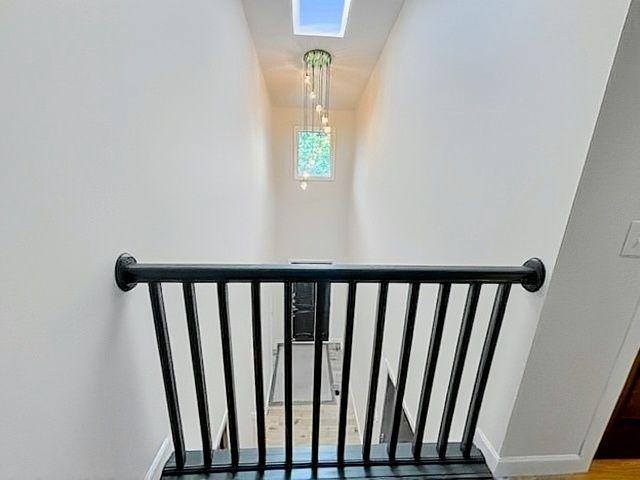 View of the two story foyer with atrium window and skylight!