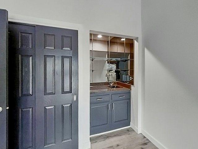 Third bedroom/den includes a large closet and wet bar!