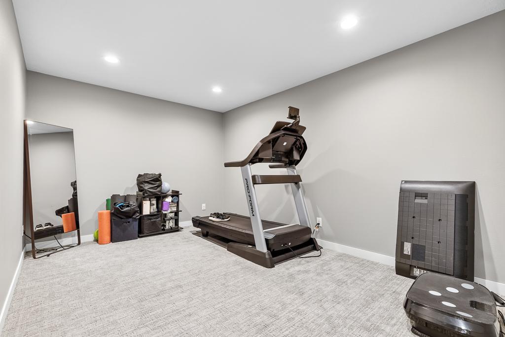 Flex room in the basement has been utilized as an exercise room