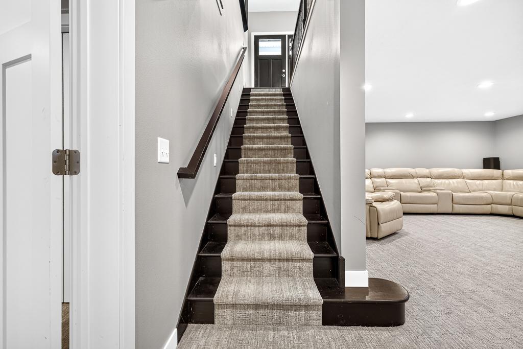 New carpeting throughout the lower level includes a runner for the stairs!