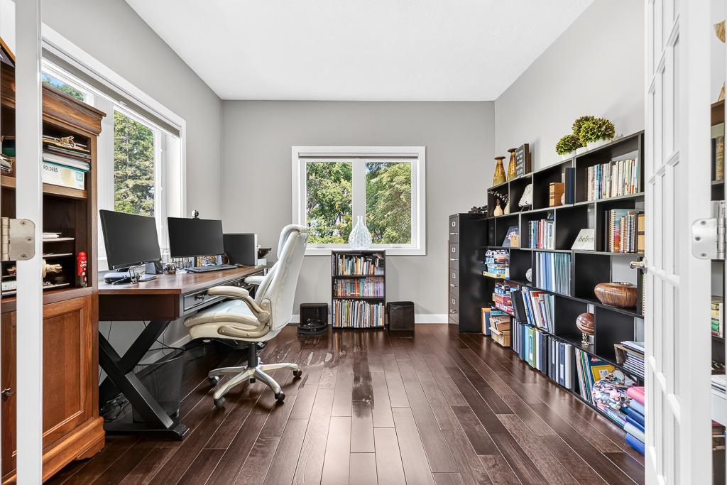 Main floor in-home office with french doors and unbeatable views