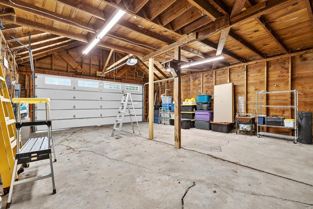 2 stall garage offers a bonus space for vehicles or just additional storage