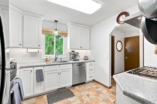 Another view of this fabulous kitchen - and a great benefit is it's right next to the garage so carrying in groceries is easy!