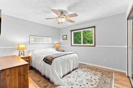 Primary bedroom on the upper level. One of two beds on this level