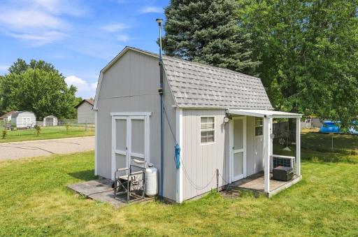 Heated and cooled shed with electricity - ready for all your projects or to turn in to a man cave or she shed - or kids play house or Home office? So many options with this one.