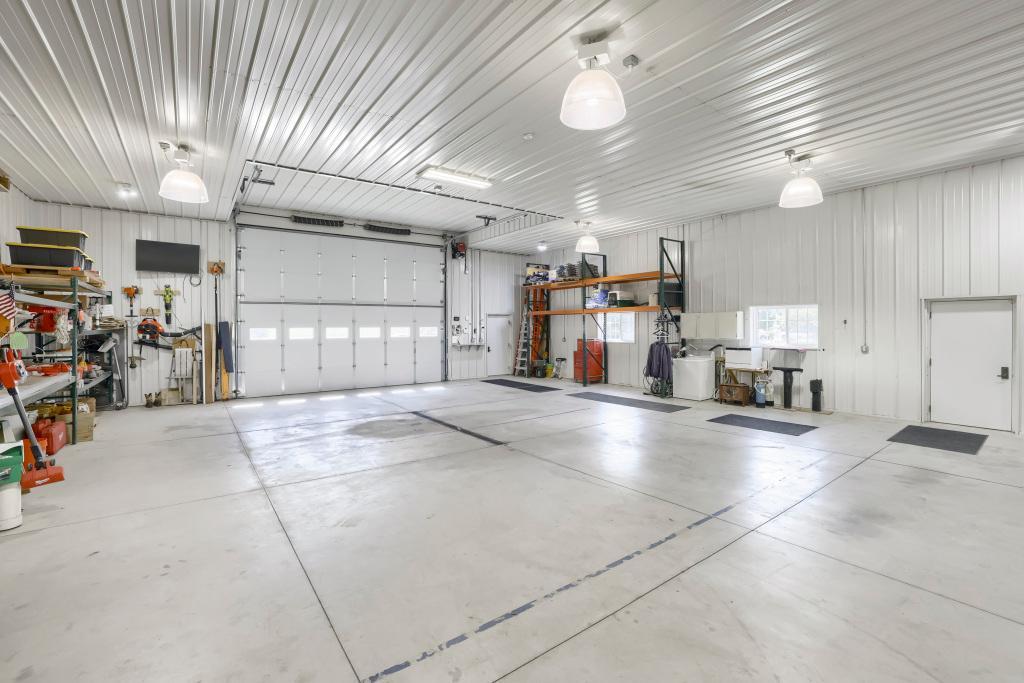 9815 Pioneer Trail - HUGE 42' x 80 ft gold shed with 14' x 18' door! FOUR Zone in floor heat!