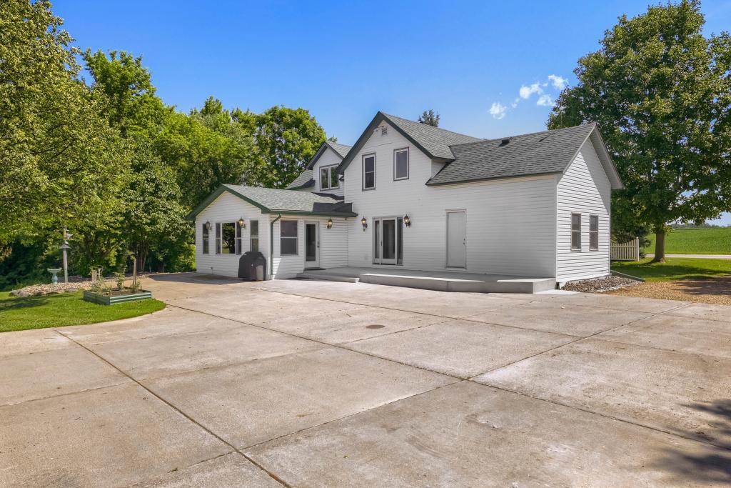 9815 Pioneer Trail - Two Patios and a HUGE Concrete Slab to make parking EASY!