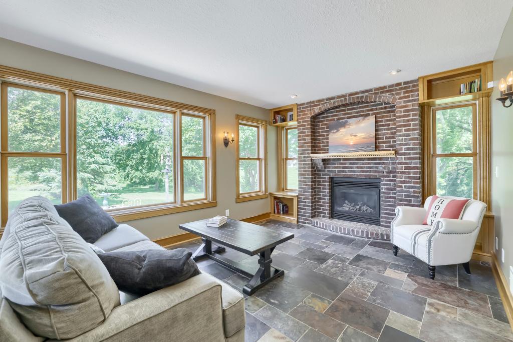 9815 Pioneer Trail - Relax by the Fire in your living room! View of your 10+ Acres as well!