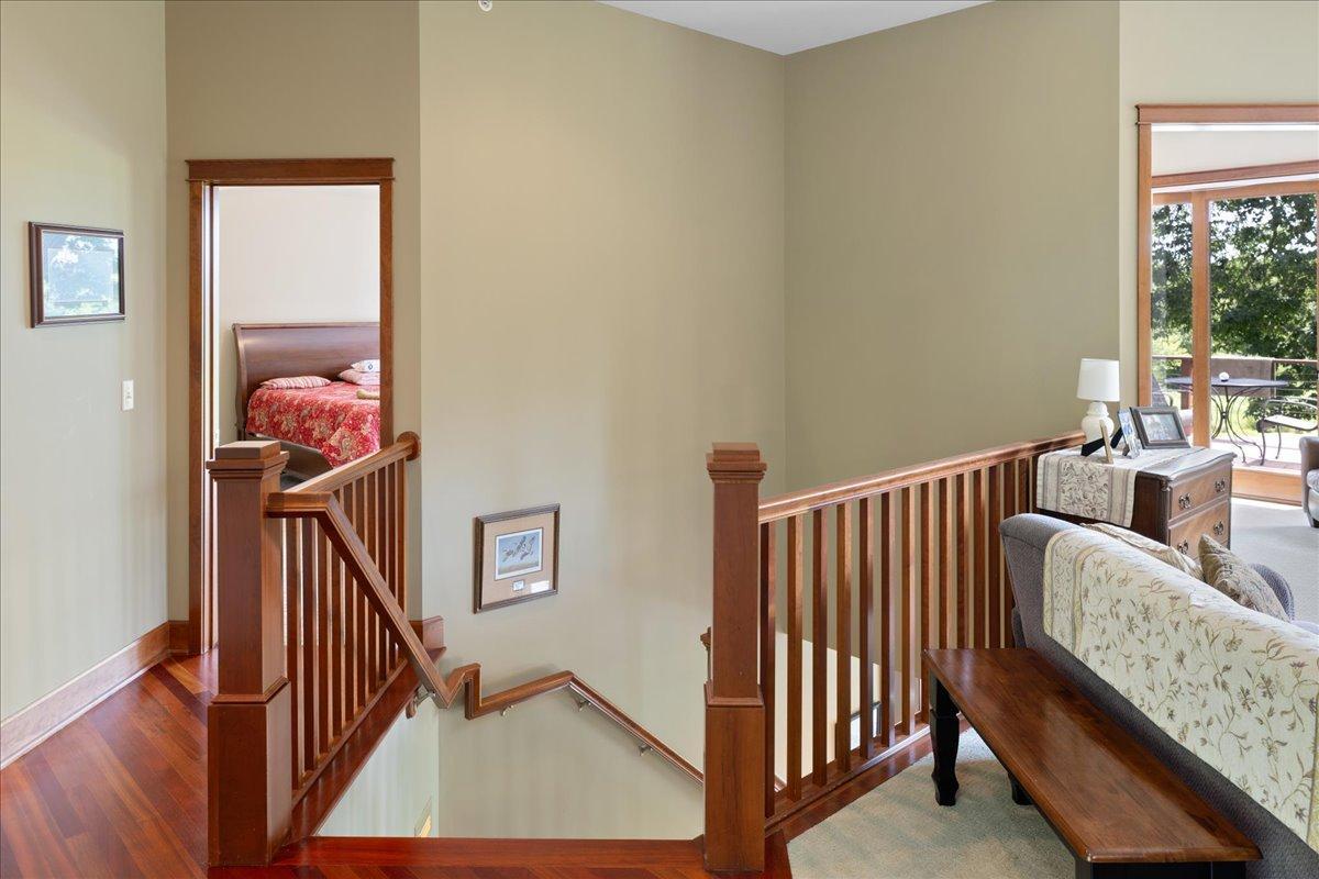 The spacious layout is accentuated by soaring 10-foot ceilings and an extra-wide open-railed staircase, creating an impressive sense of openness while allowing natural light to flow throughout the home.