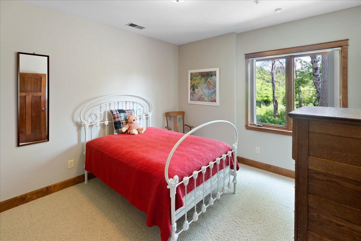 The lower-level bedrooms are generously sized and thoughtfully positioned on opposite sides of a shared 3/4 bath, providing comfort, privacy, and convenience for family members or guests.