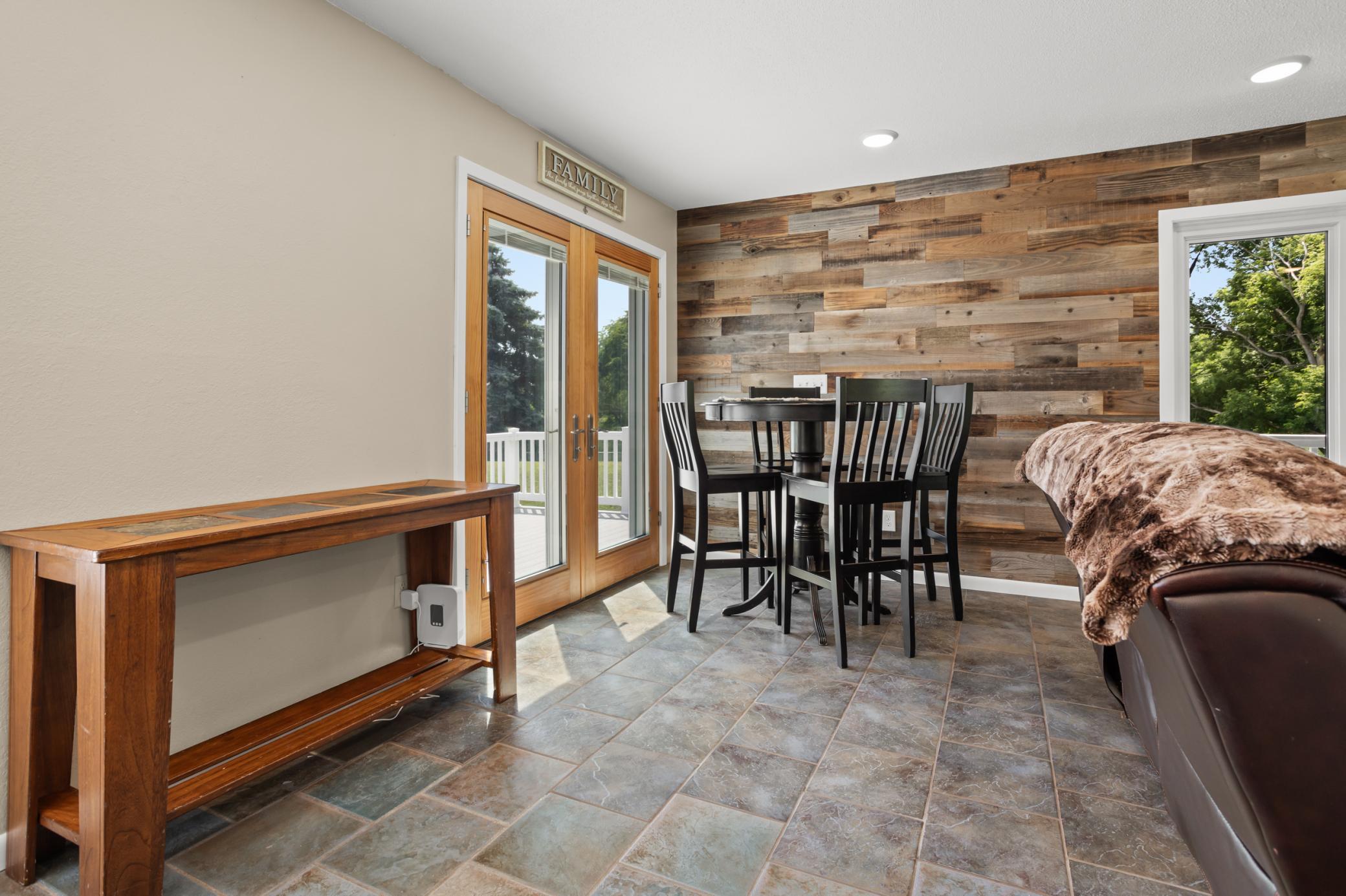informal dining area with patio view