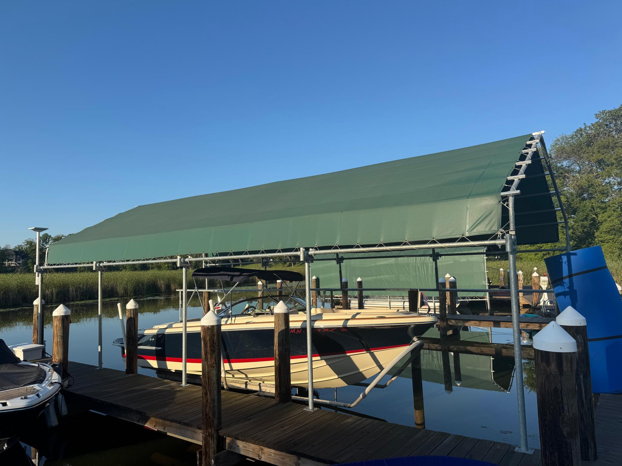 Two boat slips and dock cover included in the sale