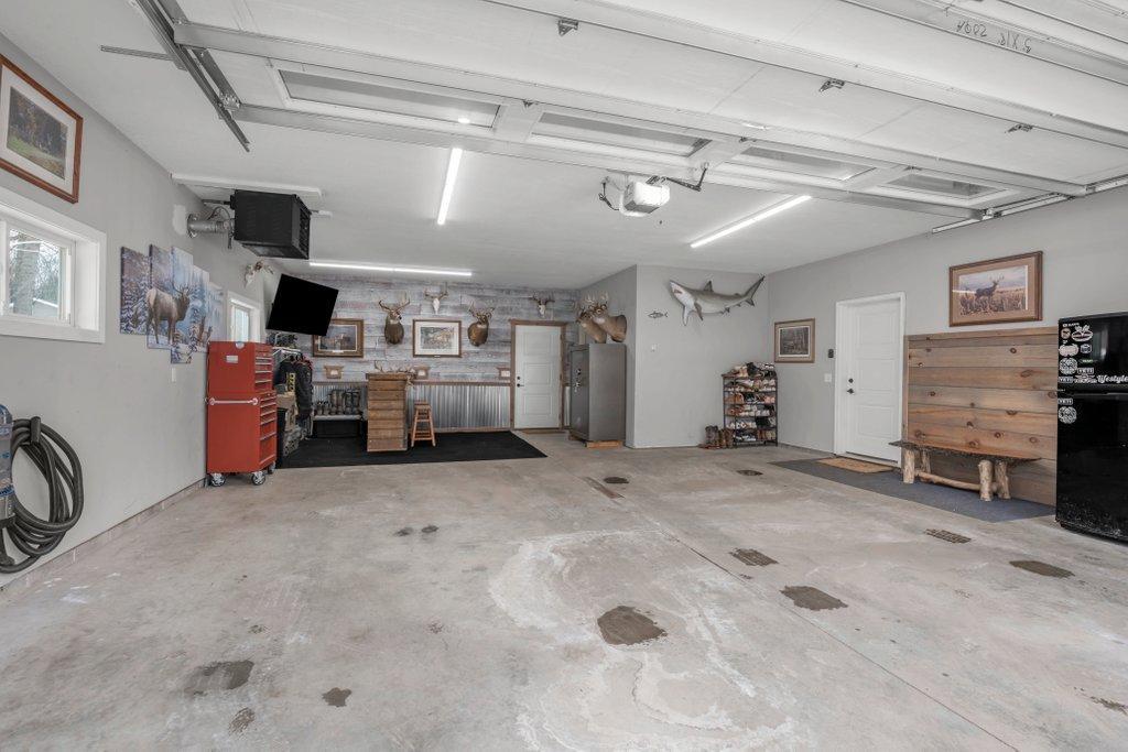 Fully Finished, Insulated, Floor Drain, Heated Garage - It's an Extension of your House!
