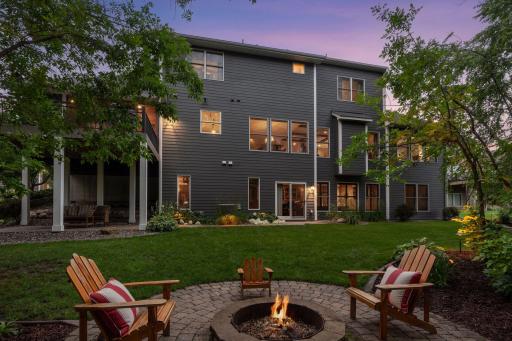 Where outdoor living takes center stageâcomplete with a warm fire and a picture-perfect evening setting.