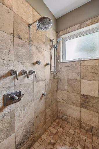 It includes a custom 7'x4' tile shower and a private water closet.